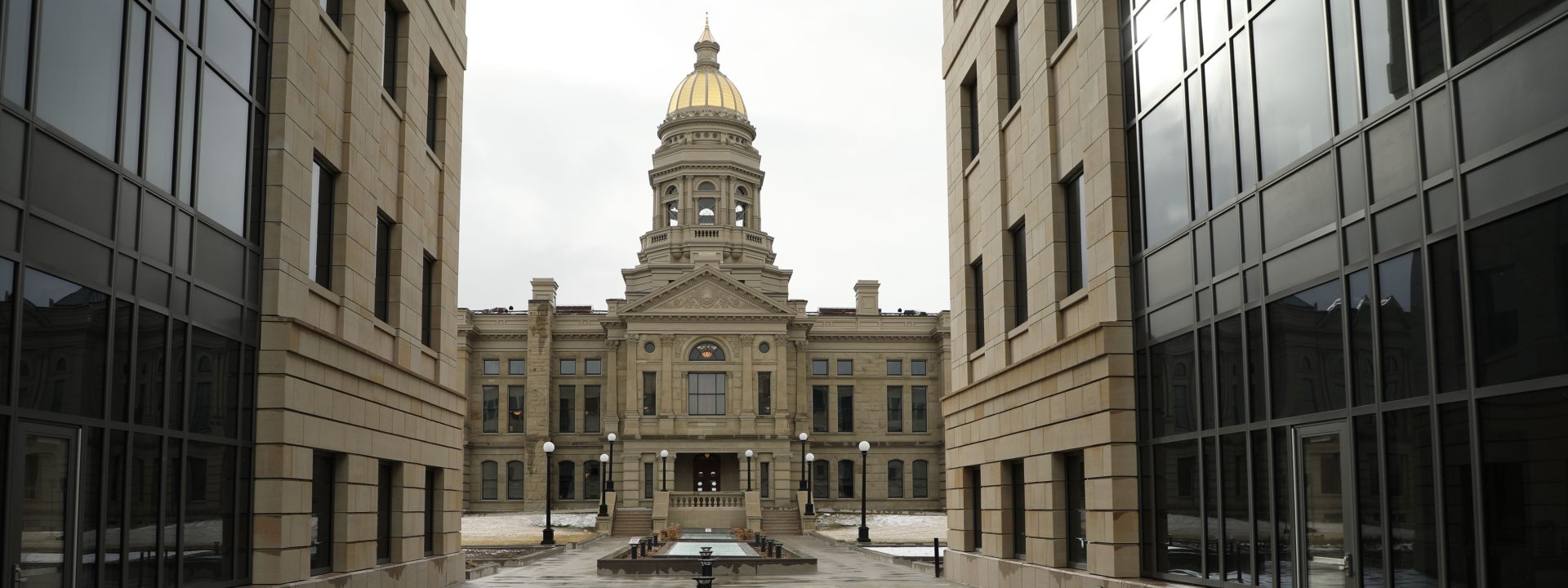 Wyoming State Capitol Building framed between two walls